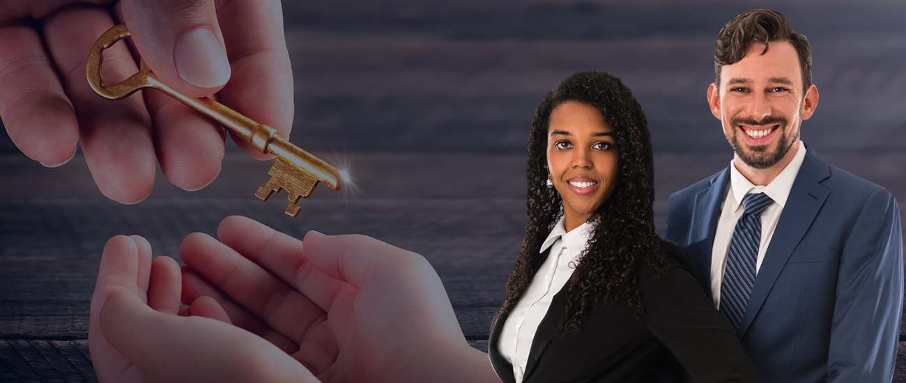 Attorneys at Florida Probate Law Group with a Hand Holding a Key Background