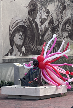 “Peace” sculpture in DeLand. Located at the north entrance of Chess Park on West Indiana Avenue, the bronze sculpture is one of the most beloved fixtures of downtown DeLand’s public art collection.