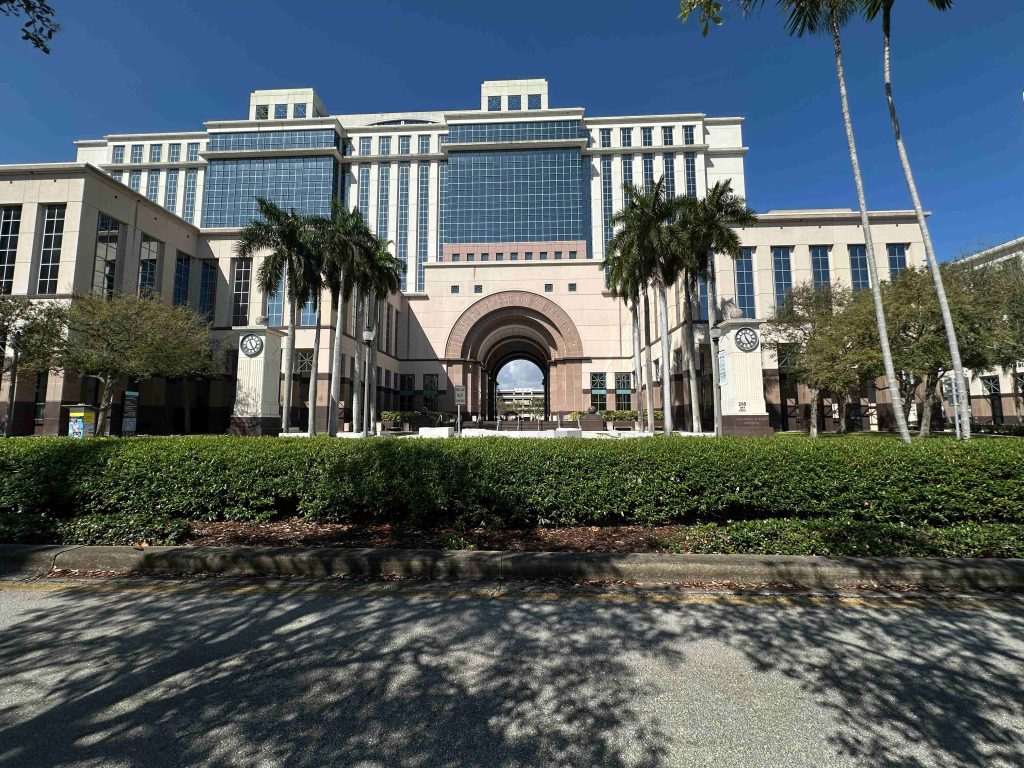Historic and modern wings of the 205 N Dixie Hwy courthouse used by a Jupiter probate lawyer for flat fee administration.